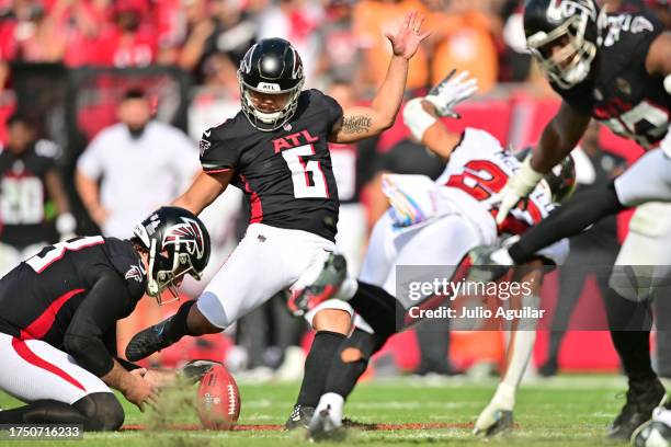 Younghoe Koo of the Atlanta Falcons kicks the game winning field goal in the fourth quarter against the Tampa Bay Buccaneers at Raymond James Stadium...