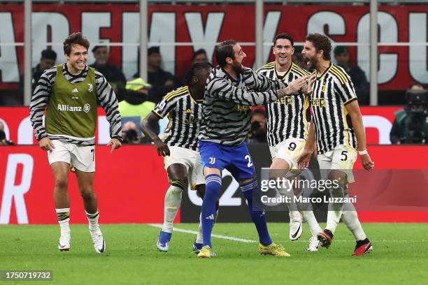 Manuel Locatelli of Juventus celebrates after scoring the team's first goal during the Serie A TIM match between AC Milan and Juventus at Stadio...