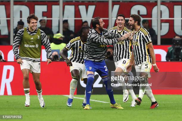 Manuel Locatelli of Juventus celebrates after scoring the team's first goal during the Serie A TIM match between AC Milan and Juventus at Stadio...