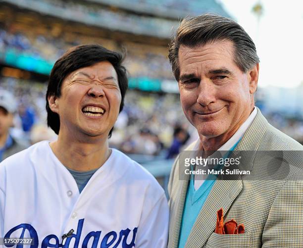 Actor Ken Jeong and former Dodger player Steve Garvey before the game between the Los Angeles Dodgers and the New York Yankees at Dodger Stadium on...