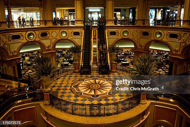 The Casino floor is seen through the doors of the Venetian Casino's Great Hall on July 29, 2013 in Macau, Macau. Macau, the only place in China with...