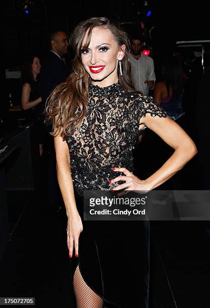Dancer Karina Smirnoff poses backstage following her performance with "Forever Tango" at the Walter Kerr Theatre on July 30, 2013 in New York City.