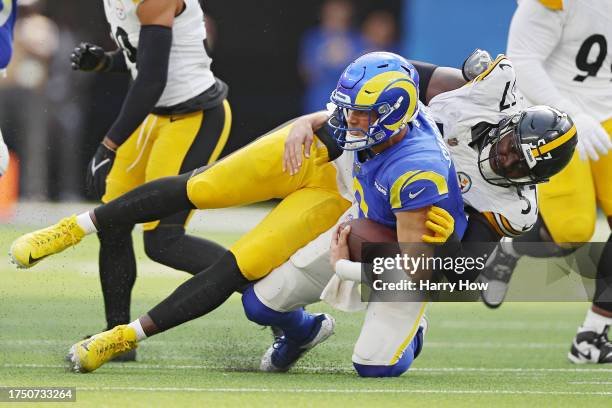 Brett Maher of the Los Angeles Rams is tackled by Montravius Adams of the Pittsburgh Steelers during the first quarter at SoFi Stadium on October 22,...