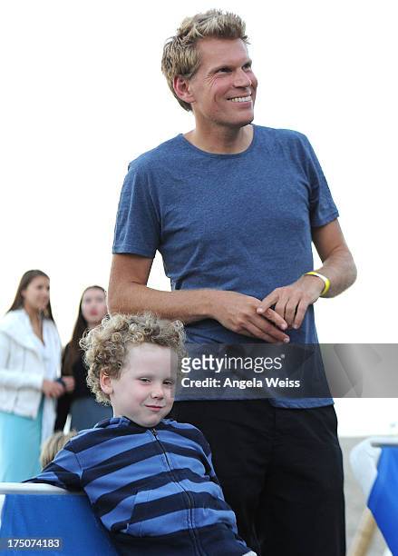 Henry Story Driver attends the Sustainable Surf and LA Waterkeeper Benefit with his mother Minnie Driver at Paradise Cove Beach Cafe on July 30, 2013...