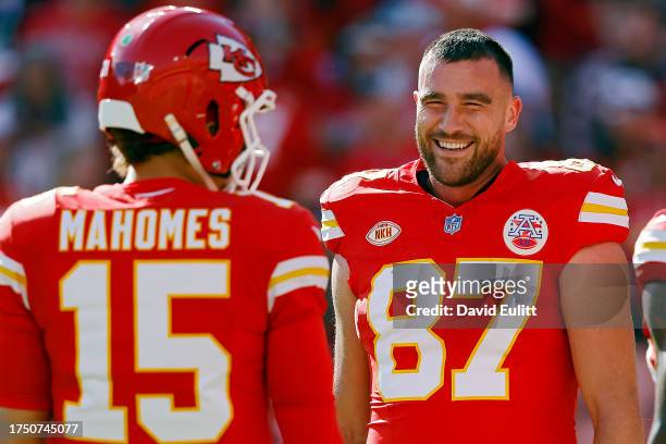 Travis Kelce and Patrick Mahomes of the Kansas City Chiefs talk before the game against the Los Angeles Chargers at GEHA Field at Arrowhead Stadium...