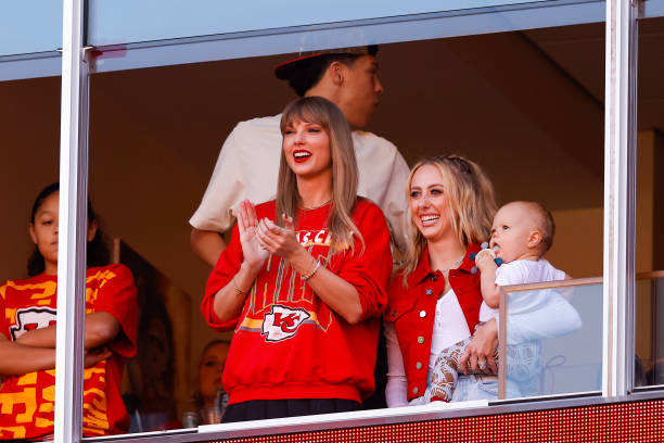 Taylor Swift and Brittany Mahomes look on during a game between the Los Angeles Chargers and Kansas City Chiefs at GEHA Field at Arrowhead Stadium on...