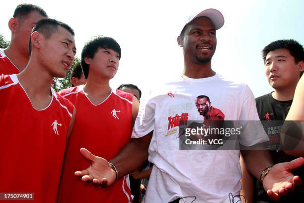 American professional basketball player Chuck Hayes of the Sacramento Kings meets fans at Jinan Olympic Sports Center on July 31, 2013 in Jinan,...