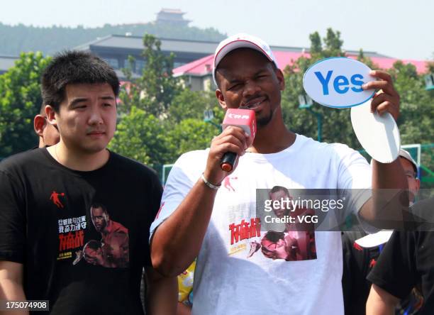 American professional basketball player Chuck Hayes of the Sacramento Kings meets fans at Jinan Olympic Sports Center on July 31, 2013 in Jinan,...