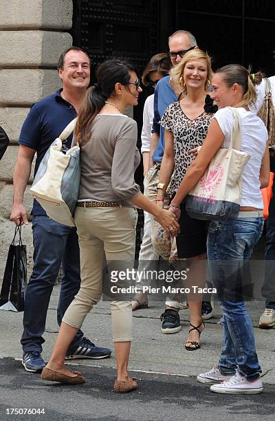 Giulio Violati, Maria Grazia Cucinotta, Regina Baresi and Maria Grazia Severi are sighted in via Montenapoleone on July 29, 2013 in Milan, Italy.