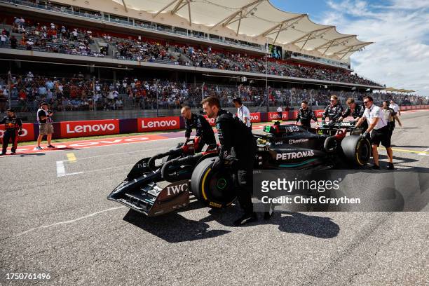 Lewis Hamilton of Great Britain and Mercedes preapres to drive on the grid prior to the F1 Grand Prix of United States at Circuit of The Americas on...