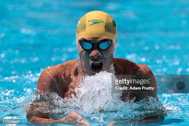Kenneth To of Australia competes during the Swimming Men's 200m Medley preliminaries heat three on day twelve of the 15th FINA World Championships at...