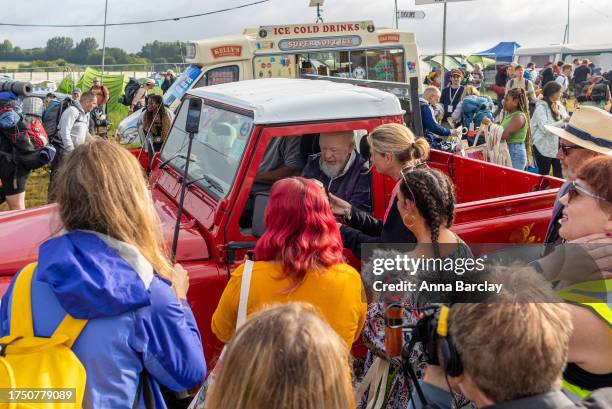 Festival founder Michael Eavis welcomes the public from his red Land Rover Defender as the gates open on Day 1 of Glastonbury Festival 2023 on June...