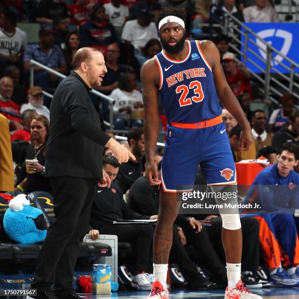 Head Coach Tom Thibodeau of the New York Knicks speaks to Mitchell Robinson of the New York Knicks during the game against the New Orleans Pelicans...