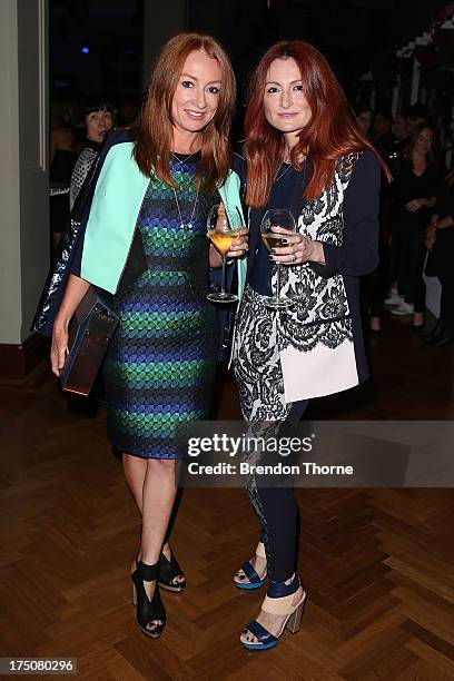 Designers Alexandra Smart and Genevieve Smart arrive at the David Jones Spring/Summer 2013 Collection Launch at David Jones Elizabeth Street on July...