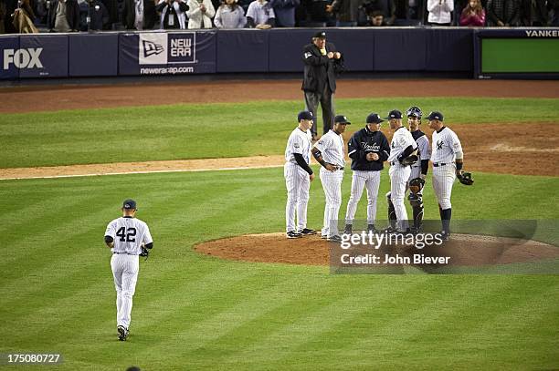 World Series: View from rear of New York Yankees Mariano Rivera taking the field during game 6 vs Philadelphia Phillies at Yankee Stadium. View of...