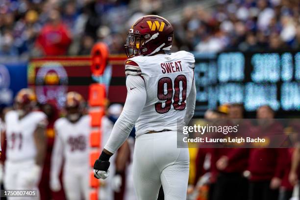 Montez Sweat of the Washington Commanders smiles during the game against the New York Giants at MetLife Stadium on October 22, 2023 in East...