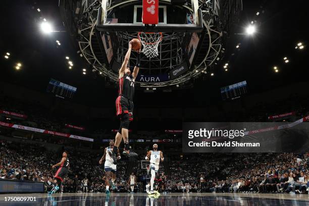 Tyler Herro of the Miami Heat dunks the ball during the game against the Minnesota Timberwolves on October 28, 2023 at Target Center in Minneapolis,...
