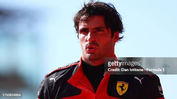 Fourth placed Carlos Sainz of Spain and Ferrari reacts in parc ferme during the F1 Grand Prix of United States at Circuit of The Americas on October...
