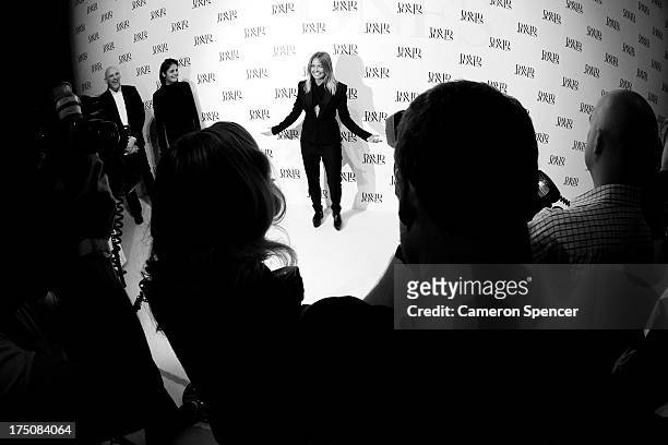 Lara Bingle poses on the arrival wall during the David Jones Spring/Summer 2013 Collection Launch at David Jones Elizabeth Street on July 31, 2013 in...