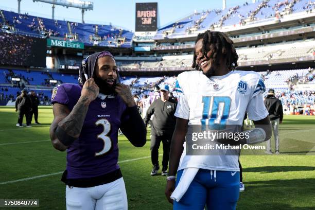Odell Beckham Jr. #3 of the Baltimore Ravens chats with Teddy Bridgewater of the Detroit Lions following an NFL football game between the Baltimore...