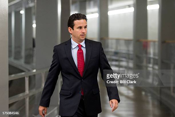 Sen. Brian Schatz, D-Hawaii, walks from the Senate office buildings to the Capitol for a vote on Wednesday, July 31, 2013.