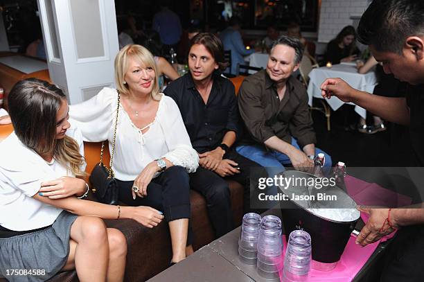 Anat Popovsky,Galina Cheban, Jonathan Cheban and Jason Binn visit the Sienna Restaurant at Pink Elephant on July 27, 2013 in East Hampton City.