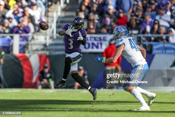 Odell Beckham Jr. #3 of the Baltimore Ravens completes a pass against Jack Campbell of the Detroit Lions during an NFL football game between the...