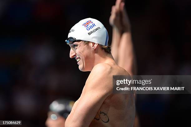 Britain's Adam Brown prepares to compete in the semi-finals of the men's 100-metre freestyle swimming event in the FINA World Championships at Palau...