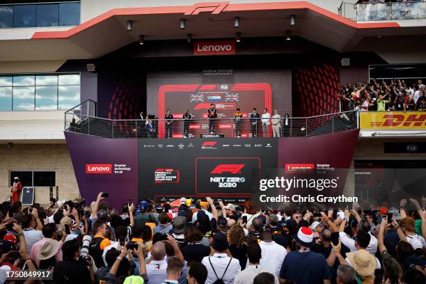 Race winner Max Verstappen of the Netherlands and Oracle Red Bull Racing, Second placed Lewis Hamilton of Great Britain and Mercedes, Third placed...