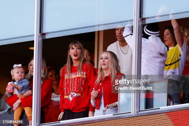 Taylor Swift and Brittany Mahomes react to a touchdown scored by Travis Kelce of the Kansas City Chiefs during the second quarter of the game against...