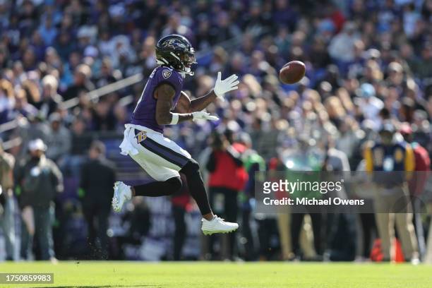 Zay Flowers of the Baltimore Ravens completes a pass during an NFL football game between the Baltimore Ravens and the Detroit Lions at M&T Bank...