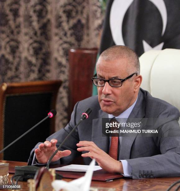 Libya's Prime Minister Ali Zeidan speaks during a press conference on July 31, 2013 in Tripoli. Libyan oil exports have plunged by more than 70...