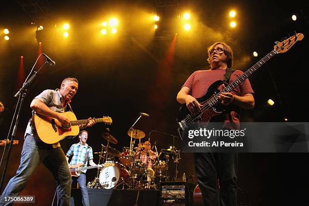 Ed Robertson and Jim Creegan of Barenaked Ladies and Robert Sledge of Guster perform when the Barenaked Ladies headline a benefit concert for...
