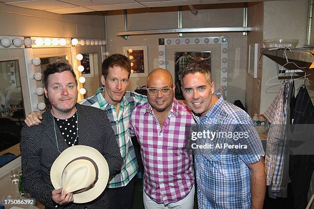Kevin Hearn, Jim Creegan, Tyler Stewart and Ed Robertson of Barenaked Ladies backstage when the Barenaked Ladies headline a benefit concert for...