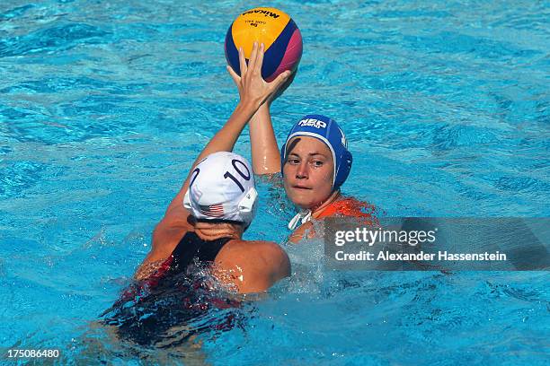 Dagmar Genee of Netherlands in action against Kelly Rulon during the Women's Water Polo classification 5th/8th round match between USA and...