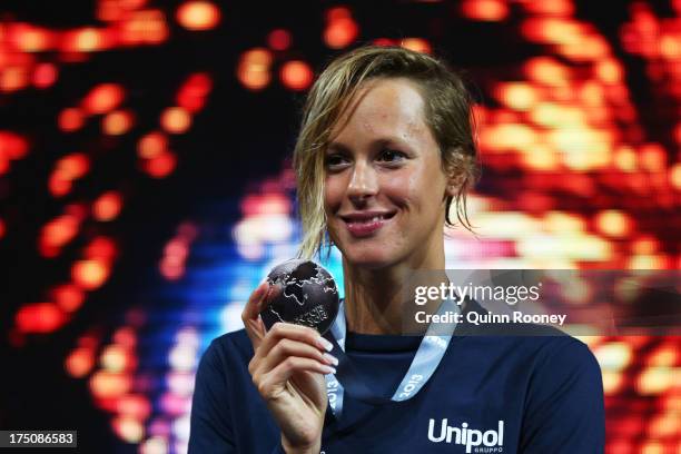 Silver medal winner Federica Pellegrini of Italy celebrates on the podium after the Swimming Women's 200m Freestyle Final on day twelve of the 15th...