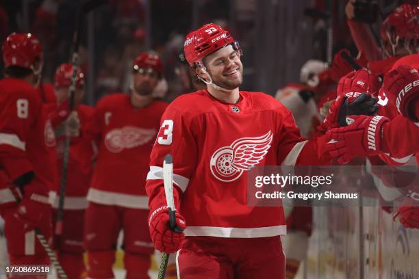 Alex DeBrincat of the Detroit Red Wings celebrates his first period goal against the Calgary Flames at Little Caesars Arena on October 22, 2023 in...