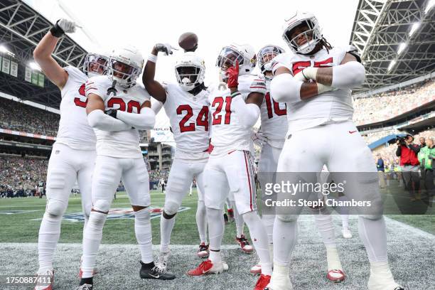 The Arizona Cardinals pose for a photo after Garrett Williams of the Arizona Cardinals intercepts the ball during the third quarter of the game...