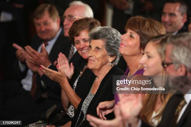 Champion University of Connecticut Huskies Women's basketball head coach Geno Auriemma's mother, Marciella Auriemma , sits in the front row to watch...