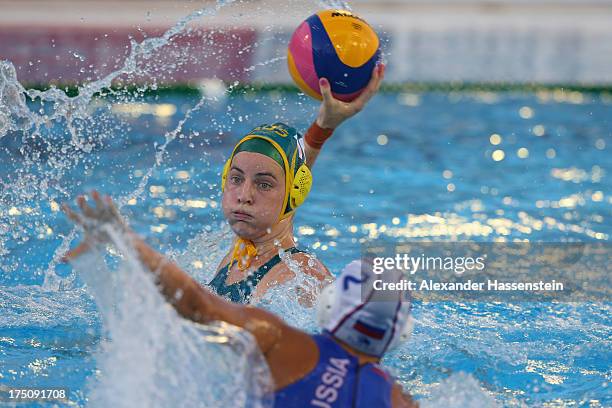 Ashleigh Southern of Australia in action against Ekaterina Prokofyeva of Russia during the Women's Water Polo Semifinal Round between Russia and...