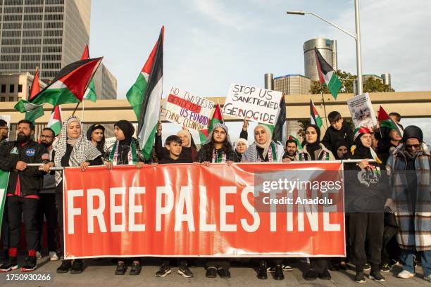 Thousands march through downtown Detroit, Michigan on October 28 calling for an immediate ceasefire and condemn Israeli attacks in Gaza, on October...