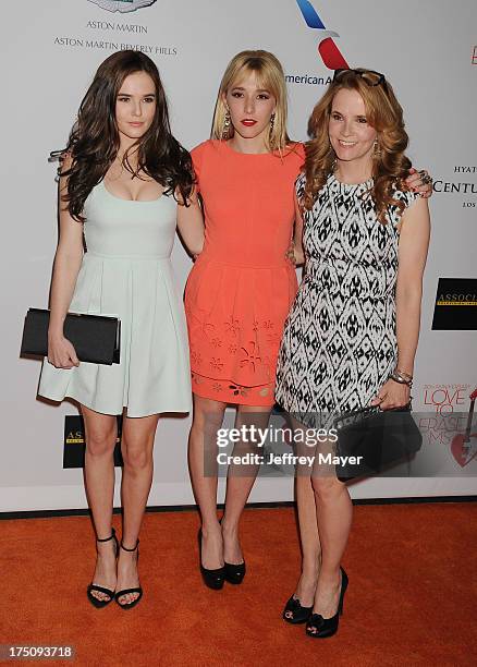 Actresses Zoey Deutch, Madelyn Deutch and Lea Thompson arrive at the 20th Annual Race To Erase MS Gala 'Love To Erase MS' at the Hyatt Regency...