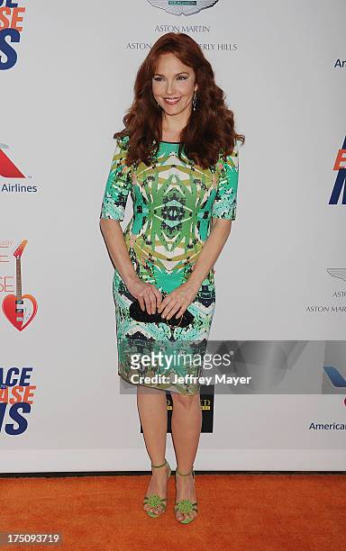 Actress Amy Yasbeck arrives at the 20th Annual Race To Erase MS Gala 'Love To Erase MS' at the Hyatt Regency Century Plaza on May 3, 2013 in Century...