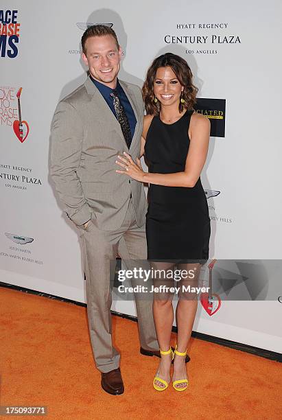 Tye Strickland and TV Personality Melissa Rycroft-Strikland arrive at the 20th Annual Race To Erase MS Gala 'Love To Erase MS' at the Hyatt Regency...