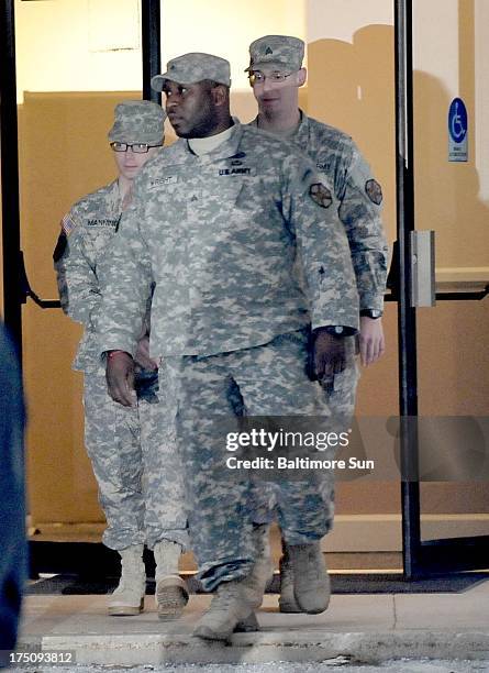 Pfc. Bradley E. Manning, the former intelligence analyst accused of sending classified documents to WikiLeaks, is lead from the courthouse following...