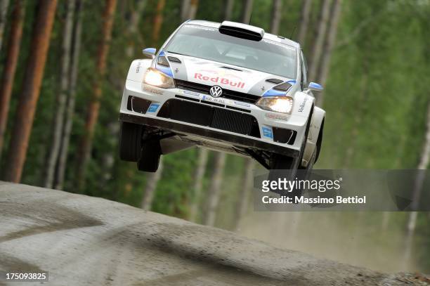 Sebastien Ogier of France and Julien Ingrassia of France compete in their Volkswagen Motorsport Volkswagen Polo R WRC during the Shakedown of the WRC...
