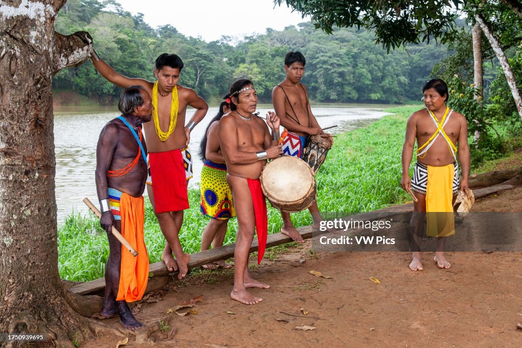 Embera Instruments Indigenous Embera men in traditional dress with musical instruments ...