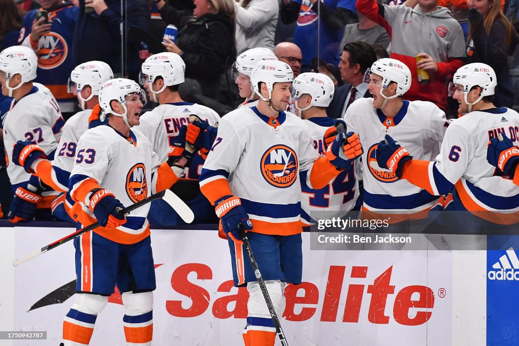 Matt Martin of the New York Islanders high-fives his teammates after ...