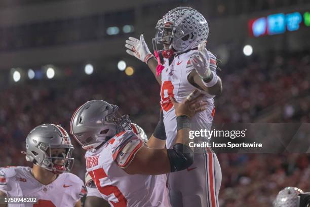 Ohio State Buckeyes wide receiver Marvin Harrison Jr. Catches a touchdown pass durning a college football game between the Ohio State Buckeyes and...