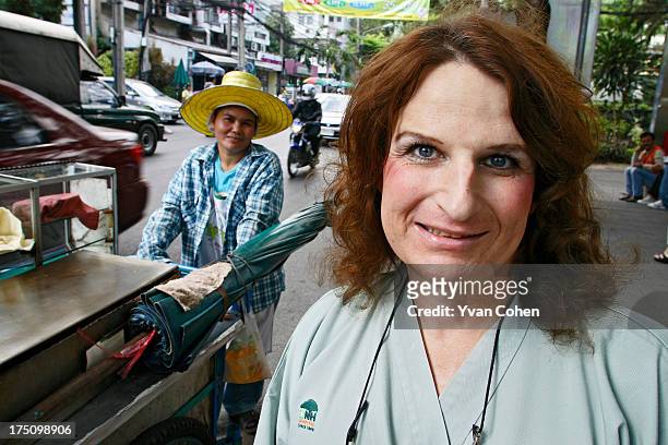 Mandy, a 49-year-old American transexual, outside the Bangkok Nursing Home hospital in downtown Bangkok. After years of ostracisation in the US,...